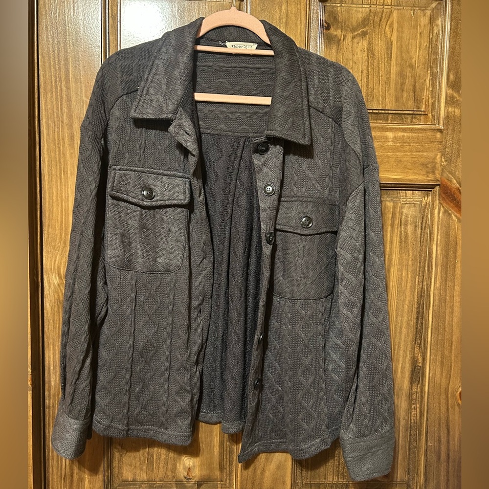Dark gray jacket.